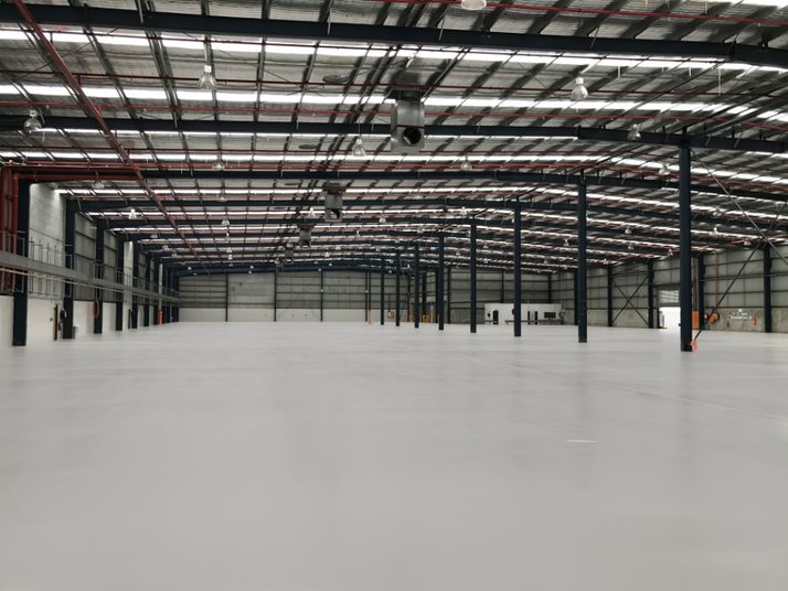 Large warehouse with seamless industrial epoxy coating